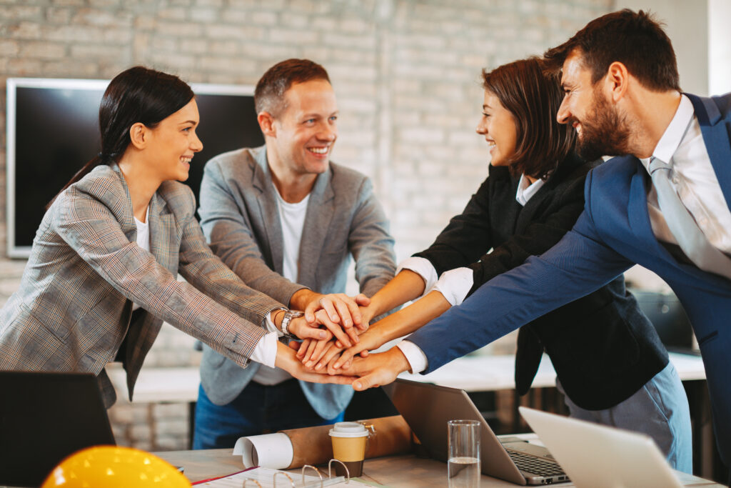 teamwork success professionals stacking hands